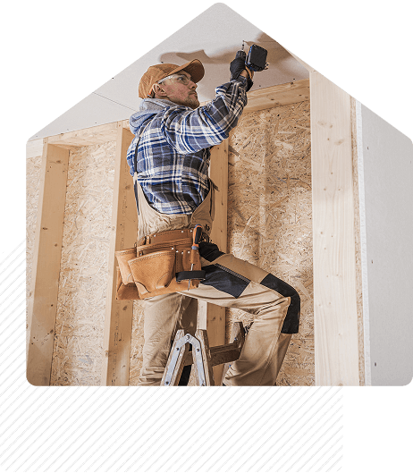 Contractor working on walls