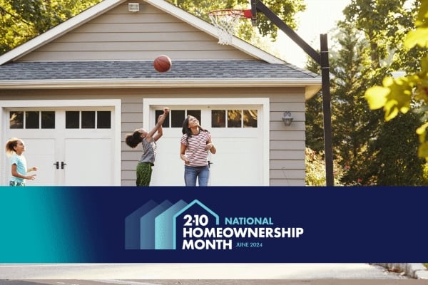 a mother and her daughters playing basketball in the driveway