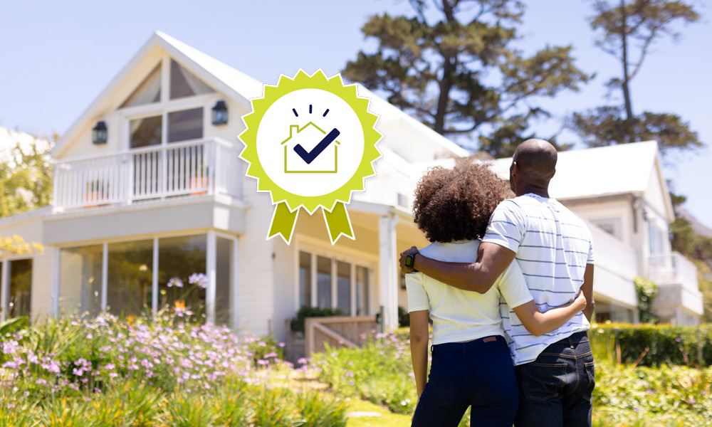 Couple admiring newly purchased home