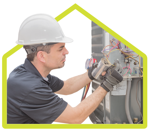 Repair man fixing an appliance