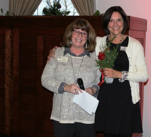 Lori Bonnstetter (pictured on the right) receiving her award. 