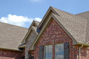 Roof line of a brick house with gables