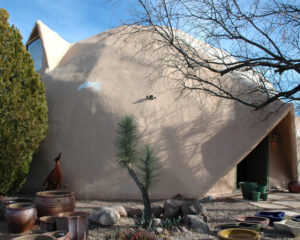 Geodesic Dome house that's all gray and has no windows
