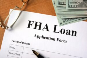 FHA loan form on a wooden table.