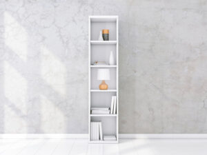 White shelving unit with books and decor in interior, concrete wall, bookshelf mockup, tall bookshelf