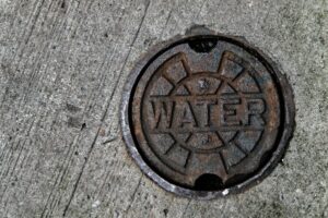 A water main manhole cover.