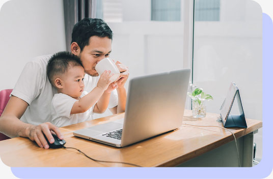 Dad and son using computer