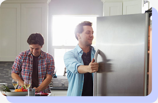 Man opening refrigerator