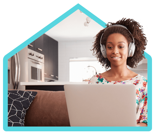 Pricing And Plans &Ndash; Connect Review &Ndash; 2-10 Home Buyers Warranty Woman working on laptop listening to music