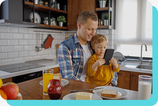 Father and daughter with a phone