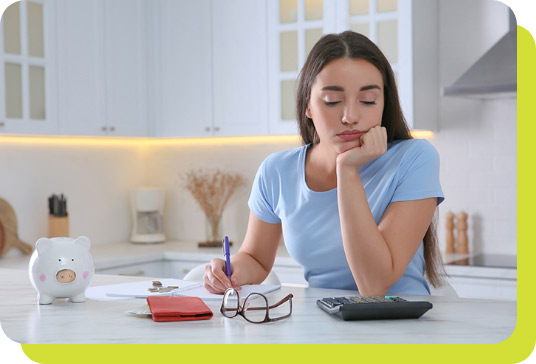 Woman using calculator