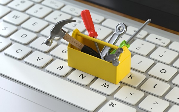 tools on the keyboard of a laptop, 3d rendering, conceptual image. service and help center 2-10 HBW